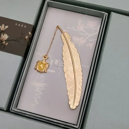Harried Potter Exquisite Bookmark Gold Feather Snitch Hogwarts Hufflepuff Ravenclaw Slytherin Gryffindor Pendant Tassel Bookmark