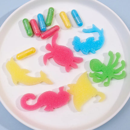 12pcs/set Creative Soaking Water Expands To Large Sponge Capsule Toys Dinosaur Sea Animal Shape Kids Bath Swimming Puzzle Toys