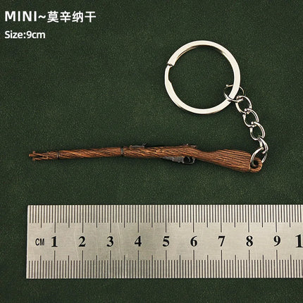Hot Game Keychain Jewelry Weapon Mini Gun Model Metal Pendant Key Chain Fashion Chaveiro Bag Car Key Holders Gift For Kids Men