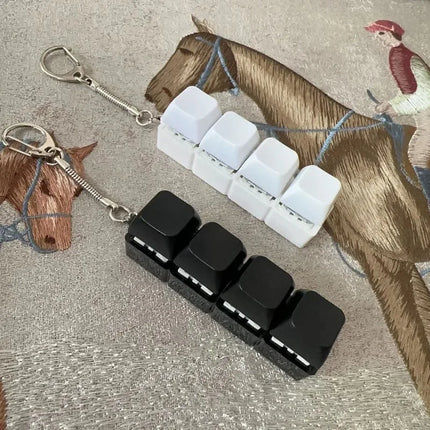 New Stress Anxiety Relief Keyboard Keychain Four Finger Button for Office Home Adults Kid Decompression Clicker Hot Gadget Gifts