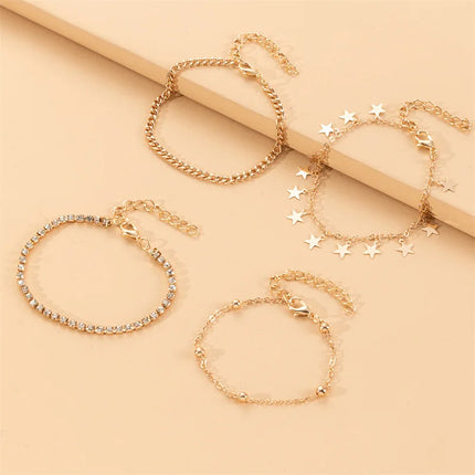 4pcs/set Seaside Star Anklet Set – A 4-Piece Alloy Foot Chain Collection for Sun-Kissed, Effortlessly Sexy Vibes.