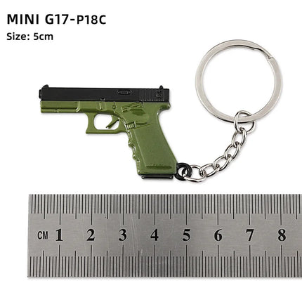 Hot Game Keychain Jewelry Weapon Mini Gun Model Metal Pendant Key Chain Fashion Chaveiro Bag Car Key Holders Gift For Kids Men