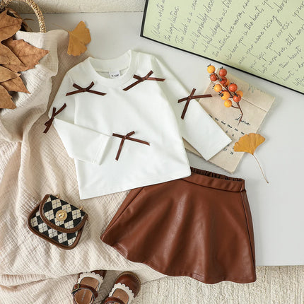 Baby Girls Clothing Set Spring Autumn Short Style Bow Long Sleeve Top+Leather Short Skirt 2Pcs For 3-24M Girls Stylish Outfit