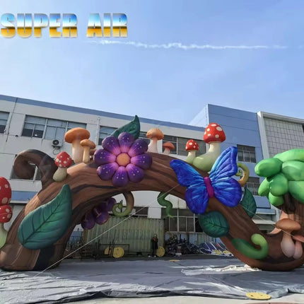 Inflatable Forest Tree Trunk Arch with Colorful Mushroom Butterfly Flower Giant Inflatable Entrance Arch for Theme Park Event Pa
