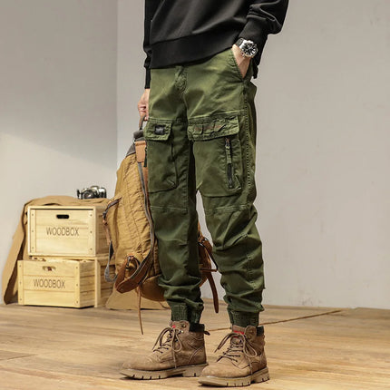 The new men's American retro sporty design in 2025 features multi-pocket, versatile drawstring work pants and stretch trousers