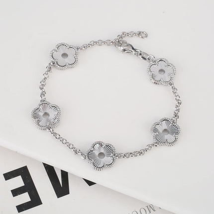 Hollow Metal Double sided Hollow Jewelry Set Sparkling Hot Selling Plum Blossom Jewelry Set Creative New Design For Women Clover