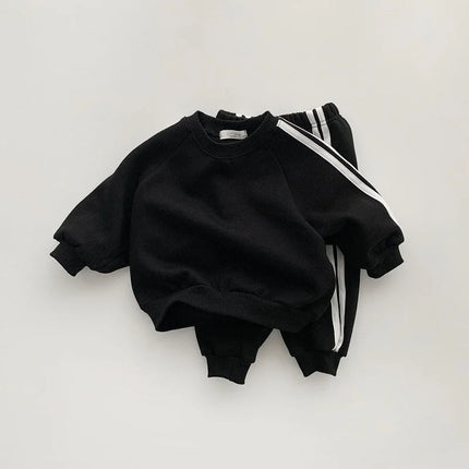 Boys and girls' spring new 2025 children's cool letter printing zipper top pants leisure sports two piece baby suit