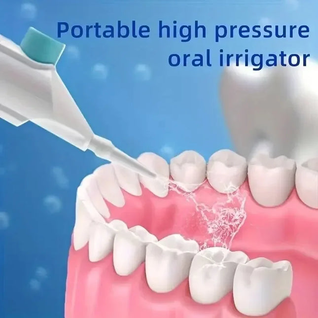 Portable high-pressure oral irrigator - manual tooth cleaner with handle, nozzle attachment for gum health