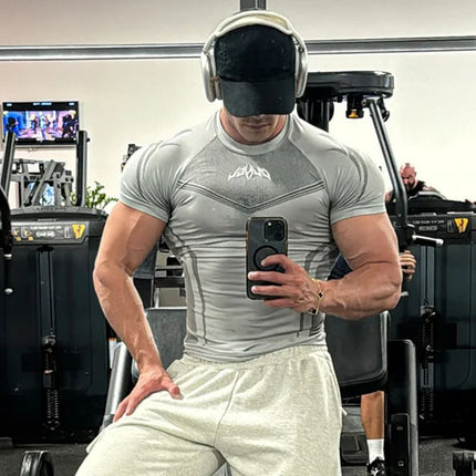 Men Tight Compression T-Shirt High Elasticity Quick-Dry Fitness Muscle Training / T-Shirt Homme Compression Ajusté Élasticité Séchage Rapide