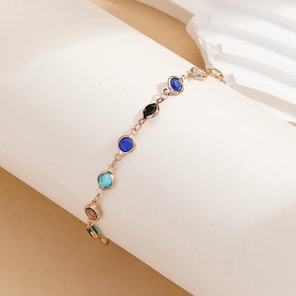 Kinitial Exquisite and fashionable laser plated anklet with black, blue, and multicolored white stones as an anniversary gifts