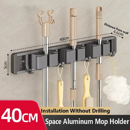 2026 New Toilet Kitchen Storage Rack Mop Clip Rack Strong Mop Holder Self Adhesive for Home Bathroom Cleaning Tools Storage