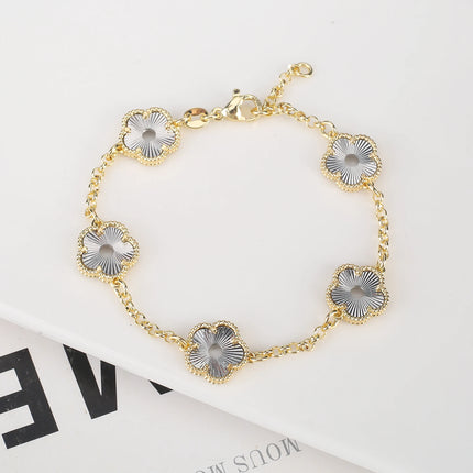 Hollow Metal Double sided Hollow Jewelry Set Sparkling Hot Selling Plum Blossom Jewelry Set Creative New Design For Women Clover