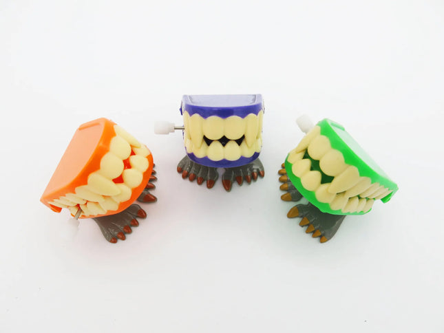 1pcs Clockwork Toy Upper Chain Jumping Tooth Toy Jump Teeth Running Clockwork Spring Wind Up Toy