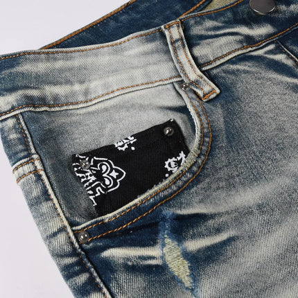 Fashionable new light blue men's jeans with pleats, washed with water, nostalgic perforation patch, men's jeans, high street des