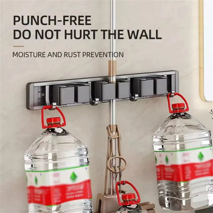 2026 New Toilet Kitchen Storage Rack Mop Clip Rack Strong Mop Holder Self Adhesive for Home Bathroom Cleaning Tools Storage