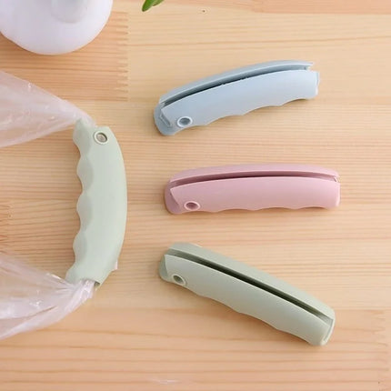 Shopping bag holder with padded handles, silicone handles for holding while shopping, non-slip hand protection, kitchen gadgets