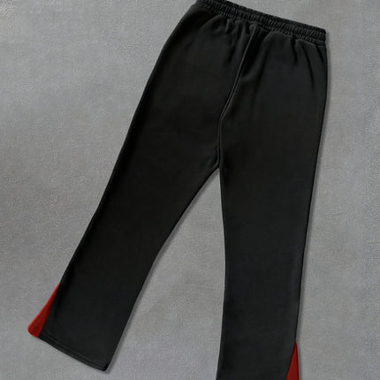Men's Street Fashionable Slightly Flared Sweatpants with Striking Red Flame Prints Artfully Crafted from Polyester Fabric