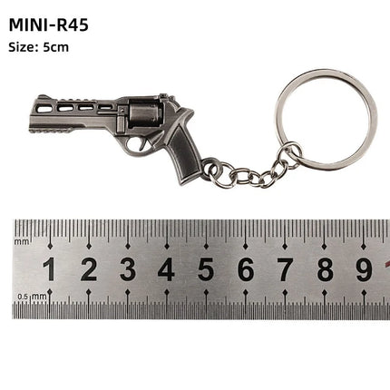 Hot Game Keychain Jewelry Weapon Mini Gun Model Metal Pendant Key Chain Fashion Chaveiro Bag Car Key Holders Gift For Kids Men