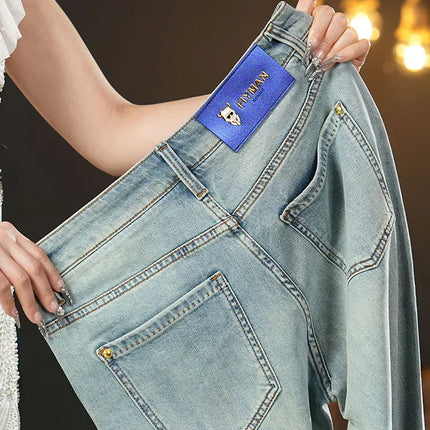 Summer thin 2025 new jeans men's slim fit small foot trendy brand fashionable light luxury elastic denim casual long pants