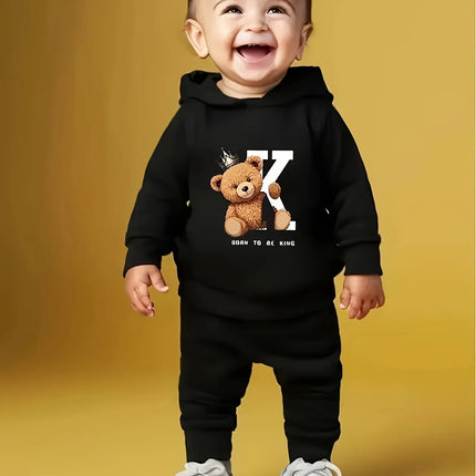 A two-piece cartoon printed fleece hoodie and long pants set for a newborn baby boy in autumn and winter