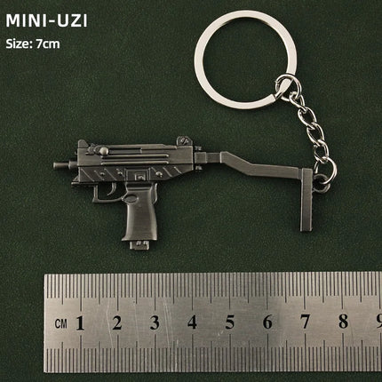 Hot Game Keychain Jewelry Weapon Mini Gun Model Metal Pendant Key Chain Fashion Chaveiro Bag Car Key Holders Gift For Kids Men