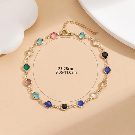 Kinitial Exquisite and fashionable laser plated anklet with black, blue, and multicolored white stones as an anniversary gifts