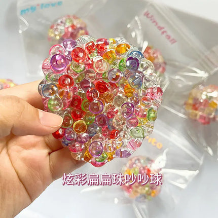 Creative colorful ice cube squishy ball, DIY squeeze toy, popping bubble beads—this viral stress-relief toy is the decompression