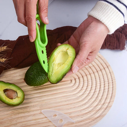 A Multifunctional Avocado Slicer Three-in-One Household Multifunctional Tool, Suitable for Outdoor Use, Home and Camping Scenari