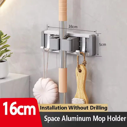 2026 New Toilet Kitchen Storage Rack Mop Clip Rack Strong Mop Holder Self Adhesive for Home Bathroom Cleaning Tools Storage