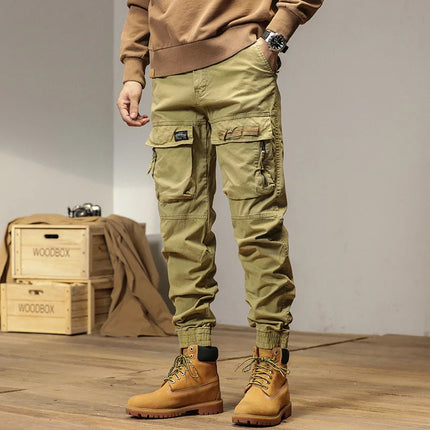 The new men's American retro sporty design in 2025 features multi-pocket, versatile drawstring work pants and stretch trousers