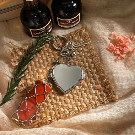 Hot Sale Original Design Bag Pendant Ins Popular Silver Love Mirror Metal Mesh Lipstick Storage Keychain Ring Cross Border