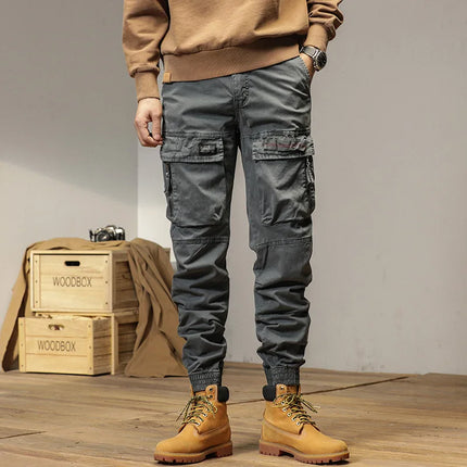 The new men's American retro sporty design in 2025 features multi-pocket, versatile drawstring work pants and stretch trousers