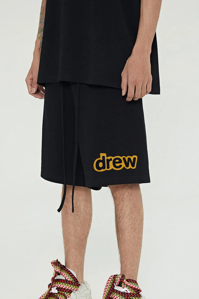 Drew House Hot Sale Shorts: Man smiling, summer style, five-inch pants, high street hip-hop outfit