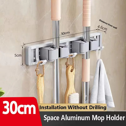 2026 New Toilet Kitchen Storage Rack Mop Clip Rack Strong Mop Holder Self Adhesive for Home Bathroom Cleaning Tools Storage