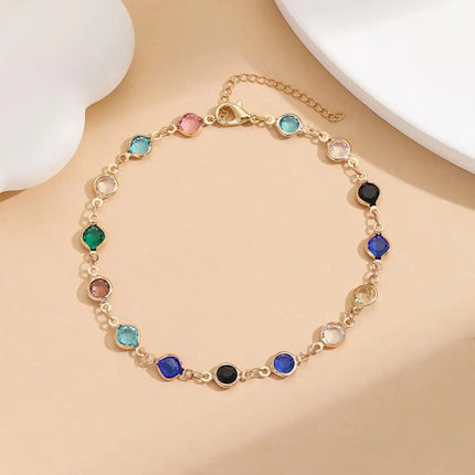 Kinitial Exquisite and fashionable laser plated anklet with black, blue, and multicolored white stones as an anniversary gifts