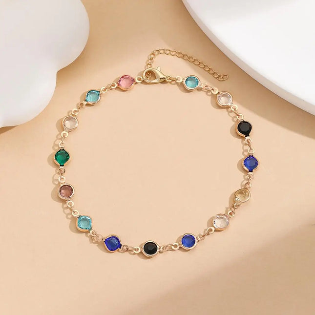 Kinitial Exquisite and fashionable laser plated anklet with black, blue, and multicolored white stones as an anniversary gifts