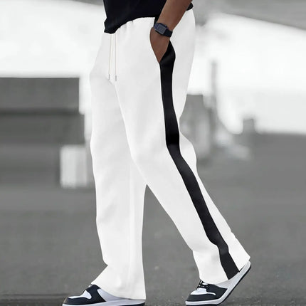 Spring and Autumn of men's casual pants will be a major release: loose color-blocking and sporty straight-leg sweatpants