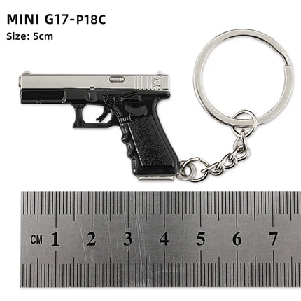 Hot Game Keychain Jewelry Weapon Mini Gun Model Metal Pendant Key Chain Fashion Chaveiro Bag Car Key Holders Gift For Kids Men