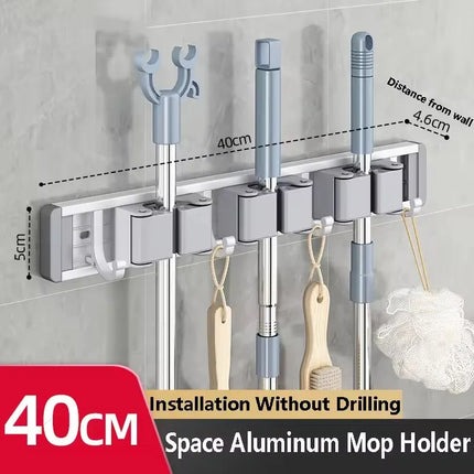 2026 New Toilet Kitchen Storage Rack Mop Clip Rack Strong Mop Holder Self Adhesive for Home Bathroom Cleaning Tools Storage