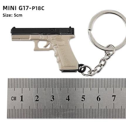 Hot Game Keychain Jewelry Weapon Mini Gun Model Metal Pendant Key Chain Fashion Chaveiro Bag Car Key Holders Gift For Kids Men