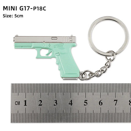 Hot Game Keychain Jewelry Weapon Mini Gun Model Metal Pendant Key Chain Fashion Chaveiro Bag Car Key Holders Gift For Kids Men