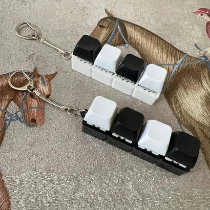 New Stress Anxiety Relief Keyboard Keychain Four Finger Button for Office Home Adults Kid Decompression Clicker Hot Gadget Gifts