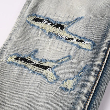 Fashionable new light blue men's jeans with pleats, washed with water, nostalgic perforation patch, men's jeans, high street des