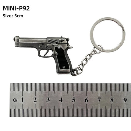 Hot Game Keychain Jewelry Weapon Mini Gun Model Metal Pendant Key Chain Fashion Chaveiro Bag Car Key Holders Gift For Kids Men