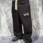 black trousers / L
