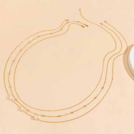Sexy and Minimalist Imitation Pearl Chain Metal Waist Chain Mixed and Stacked Fashion Girl Beaded Woven Body Chain Belly Chain