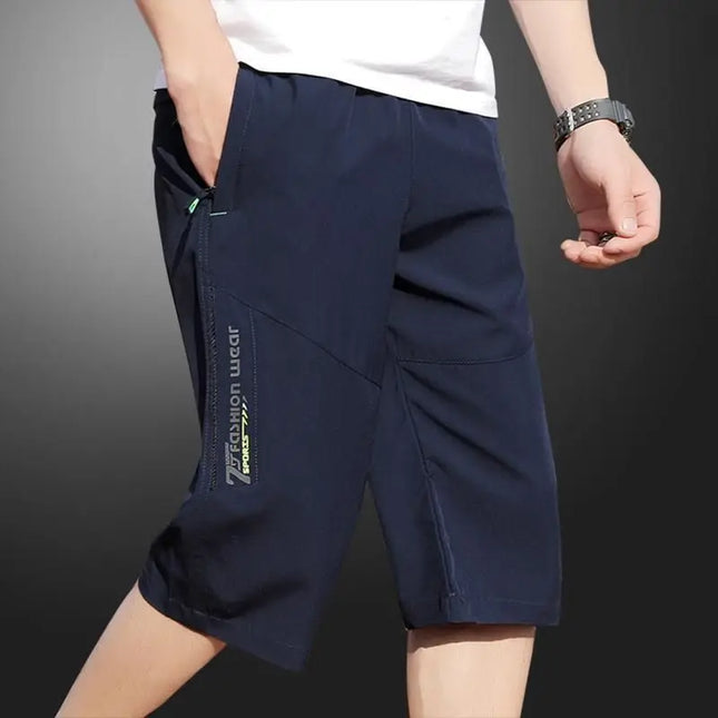 2025 New Men's Seven point Ice Silk Zipper Pocket Casual Pants Breathable Elastic Fabric Slimming Version Summer Outdoor Vacatio
