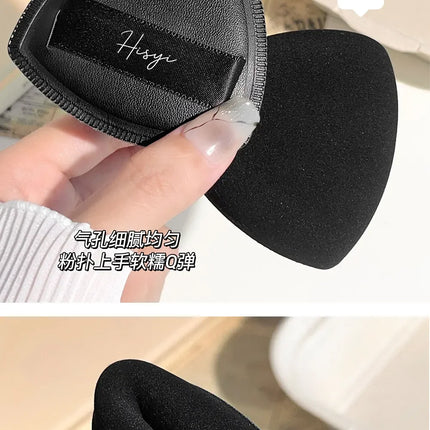 Black triangular makeup pad - Soft velvet cosmetic sponge for facial makeup. Beauty makeup sponge for applying foundation.