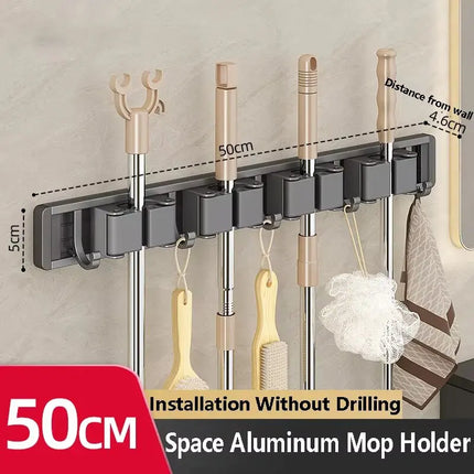 2026 New Toilet Kitchen Storage Rack Mop Clip Rack Strong Mop Holder Self Adhesive for Home Bathroom Cleaning Tools Storage