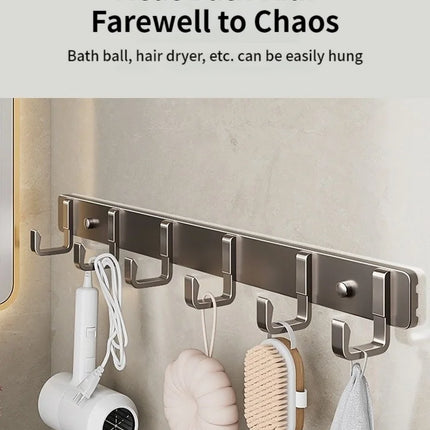 Hooks for hanging clothes at the entrance door, hanging hangers on the wall, and strong hooks for the wardrobe in th